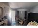 A wide angle shot of the kitchen showing an open door and several items at 4331 16Th S Ave, St Petersburg, FL 33711