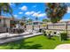 Outdoor living space with a deck, comfortable seating, and a well-maintained lawn at 4829 20Th N Ave, St Petersburg, FL 33713