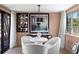 Stylish dining area with elegant decor, bright windows, and a view of the outdoor space at 4829 20Th N Ave, St Petersburg, FL 33713