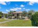 Charming home featuring a manicured front yard with decorative landscaping at 4829 20Th N Ave, St Petersburg, FL 33713