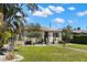 Charming single-story home with well-maintained landscaping, lush lawn, and a welcoming entrance at 4829 20Th N Ave, St Petersburg, FL 33713