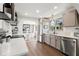 Modern kitchen with stainless steel appliances, bright cabinets, and a functional open design at 4829 20Th N Ave, St Petersburg, FL 33713