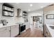 Well-equipped kitchen with stainless steel appliances, sleek countertops, and open access to the dining area at 4829 20Th N Ave, St Petersburg, FL 33713