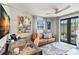 Bright office space featuring a modern desk, comfortable seating, and natural light from the window at 4829 20Th N Ave, St Petersburg, FL 33713