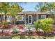 Charming single-story home featuring a well-maintained front yard with mature landscaping and a welcoming entrance at 5254 23Rd N Ave, St Petersburg, FL 33710
