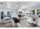 Open kitchen featuring a center island with breakfast bar and a smooth transition to the living space, perfect for gathering at 5254 23Rd N Ave, St Petersburg, FL 33710