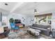 Open-concept living room with stylish furniture, bright natural light, and an open layout, seamlessly connecting living spaces at 5254 23Rd N Ave, St Petersburg, FL 33710