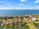 Community aerial view of waterfront homes with docks, and Gulf of Mexico in background at 6315 Marbella Blvd, Apollo Beach, FL 33572