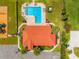 Overhead shot of a community clubhouse featuring a swimming pool and a playground at 6315 Marbella Blvd, Apollo Beach, FL 33572