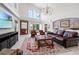 Open living room with high ceilings, tall windows, and stylish furnishings at 6315 Marbella Blvd, Apollo Beach, FL 33572