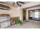 Great outdoor kitchen with stainless grill, storage, counterspace and nearby doors to interior living space at 6315 Marbella Blvd, Apollo Beach, FL 33572