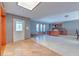 Bright foyer with stylish tile flooring and views of the office offer a warm welcome at 6709 W Knights Griffin Rd, Plant City, FL 33565
