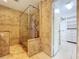 Well appointed bathroom with a glass enclosed shower and access to a walk-in closet at 7307 Summerbridge Dr, Tampa, FL 33634