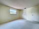 Bedroom with closet, window, and neutral carpeting at 7307 Summerbridge Dr, Tampa, FL 33634