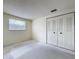 Bedroom featuring a window and closet with neutral color carpet at 7307 Summerbridge Dr, Tampa, FL 33634