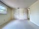 Room with carpet, window, and closet leading to bathroom at 7307 Summerbridge Dr, Tampa, FL 33634