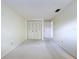 Cozy bedroom with neutral carpet and a closet with double doors at 7307 Summerbridge Dr, Tampa, FL 33634