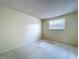 Neutral bedroom featuring a window and ample natural light at 7307 Summerbridge Dr, Tampa, FL 33634