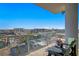 Relaxing balcony view features city skyline with outdoor chairs and glass railings at 777 3Rd N Ave # 1408, St Petersburg, FL 33701