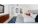 Well-lit bedroom with a plush bed, elegant rug, and stylish decor, offering a comfortable retreat at 777 3Rd N Ave # 1408, St Petersburg, FL 33701