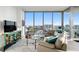 Spacious living room features designer furnishings, floor to ceiling windows and amazing city views at 777 3Rd N Ave # 1408, St Petersburg, FL 33701