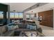 Spacious living room with views features designer furnishings, floor to ceiling windows and balcony access at 777 3Rd N Ave # 1408, St Petersburg, FL 33701
