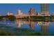 Picturesque waterfront view of the city skyline at dusk, reflecting on the tranquil water at 777 3Rd N Ave # 1408, St Petersburg, FL 33701