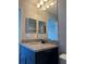 Modern bathroom features a granite countertop, vessel sink and updated lighting at 10200 Gandy N Blvd # 1133, St Petersburg, FL 33702