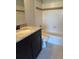 Bathroom featuring tiled walls, granite counters, and a bathtub with a modern faucet at 10200 Gandy N Blvd # 1133, St Petersburg, FL 33702