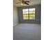 This bedroom is bright, airy, and spacious with a ceiling fan at 10200 Gandy N Blvd # 1133, St Petersburg, FL 33702