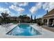Enjoy community amenities, including a large outdoor swimming pool and lounge area at 10200 Gandy N Blvd # 1133, St Petersburg, FL 33702