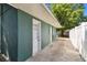 House exterior featuring a private patio area perfect for relaxation or outdoor dining at 1046 Yale N St, St Petersburg, FL 33713