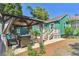 Relaxing backyard featuring a gazebo with outdoor furniture and mature landscaping at 1046 Yale N St, St Petersburg, FL 33713