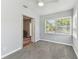 Spacious bedroom with plush carpet, natural light, and neutral wall color at 1046 Yale N St, St Petersburg, FL 33713