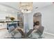 Bright dining room with modern lighting and stainless steel appliances at 1046 Yale N St, St Petersburg, FL 33713