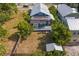 A charming single-Gathering home with fenced in yard, mature trees, and alley access is ready for move in at 107 W Amelia Ave, Tampa, FL 33602