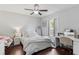 This charming bedroom has hard floors and offers a cozy space to relax and recharge at 107 W Amelia Ave, Tampa, FL 33602