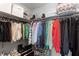 Walk-in closet with custom shelving for clothing and shoes at 107 W Amelia Ave, Tampa, FL 33602