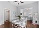 Bright and open dining area with a clear view into the living room, enhancing the home's spacious feel at 107 W Amelia Ave, Tampa, FL 33602