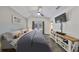 Cozy bedroom with backyard access, wood-look flooring, and plenty of storage space at 10824 Palmetto St, Riverview, FL 33569