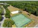 High angle shot of the community courts, sand volleyball, and basketball courts at 11503 Whispering Hollow Dr, Tampa, FL 33635
