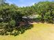 Overhead view of a playground with monkey bars and climbing equipment surrounded by trees at 11503 Whispering Hollow Dr, Tampa, FL 33635