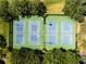 Aerial view of multiple tennis courts, perfect for recreation and enjoying outdoor sports at 11503 Whispering Hollow Dr, Tampa, FL 33635