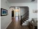 Hallway featuring tile floors and staircase at 12026 Medley Ter, Lakewood Ranch, FL 34211