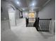 Upstairs hallway with coffered ceiling and decorative trim and railings at 12026 Medley Ter, Lakewood Ranch, FL 34211