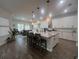 Spacious kitchen with granite countertops, stainless steel appliances and large center island at 12026 Medley Ter, Lakewood Ranch, FL 34211