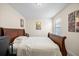 Bedroom with a comfortable bed and large window at 1227 Ballard Green Pl, Brandon, FL 33511