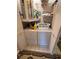 A laundry closet contains the washer, dryer, and water heater at 12920 Wedgewood Way # A, Hudson, FL 34667