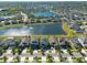 Gorgeous aerial view of a neighborhood with beautiful homes surrounding multiple scenic lakes at 13639 Ashlar Slate Pl, Riverview, FL 33579