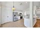 Bright kitchen boasts stainless steel appliances, white cabinetry, and a breakfast bar at 1518 Rolling Meadow Dr, Valrico, FL 33594